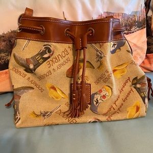 Dooney & Bourke 1975 Texas western bucket purse.